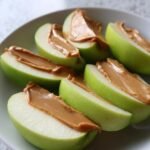 Apple slices with natural peanut butter