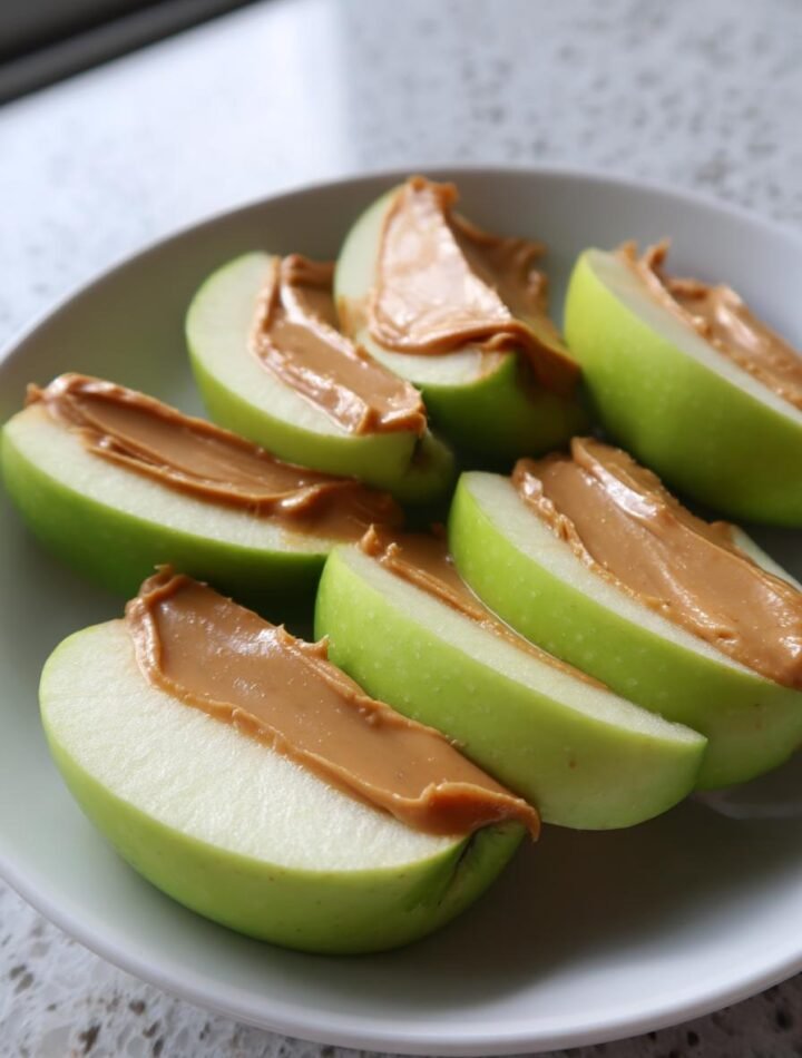 Apple slices with natural peanut butter