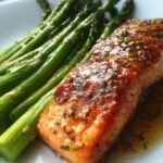 Baked salmon with asparagus and Dijon glaze.