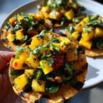 Charred shishito and mango salsa tostadas