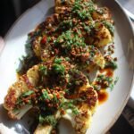 Chimichurri roasted cauliflower steaks with toasted seeds