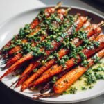 Tahini maple roasted carrots with pistachio gremolata